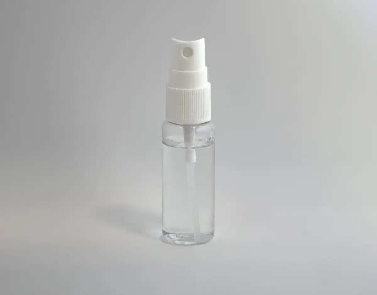 clear and white spray bottle